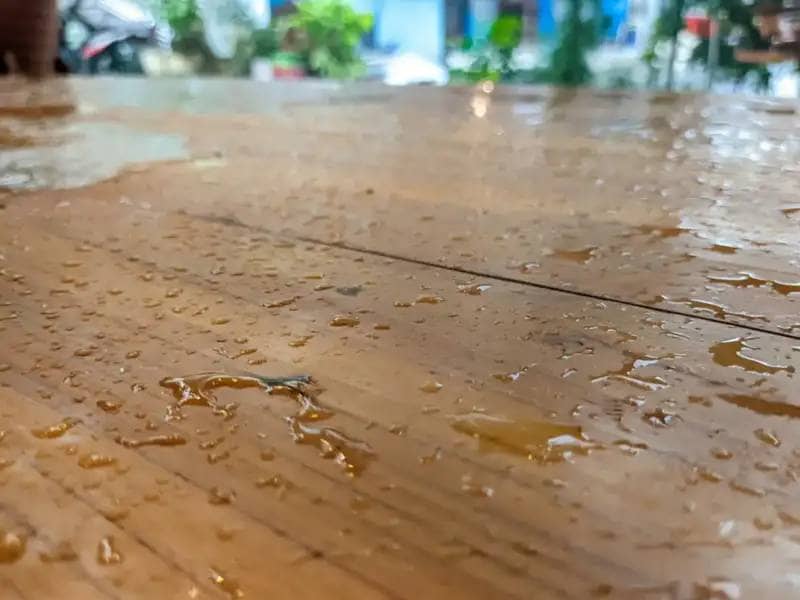 wet wooden furniture surface
